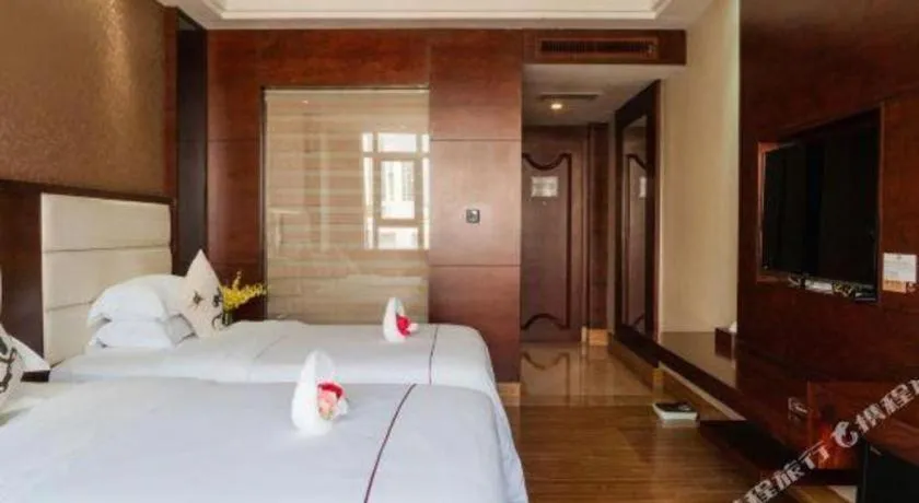 Bed in Haikou Kai Wei Hotel