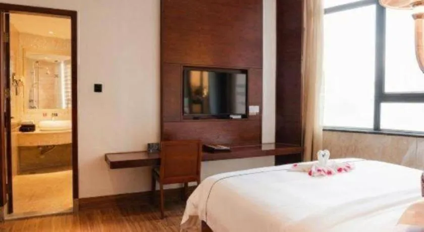 Bed in Haikou Kai Wei Hotel