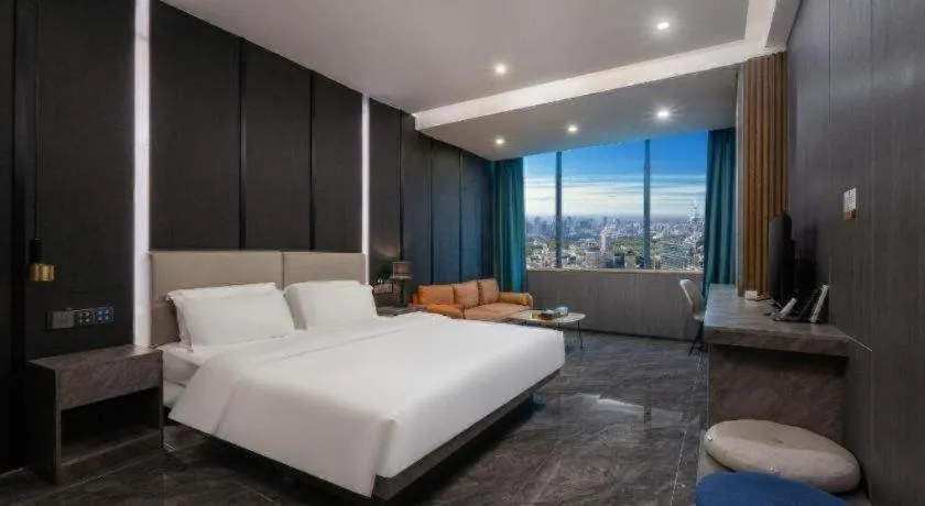 Bed in Haikou Kai Wei Hotel