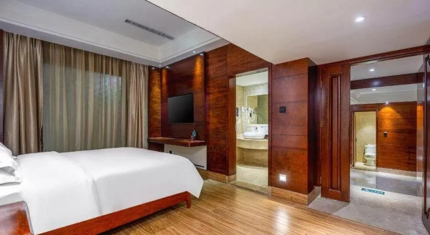 Bed in Haikou Kai Wei Hotel