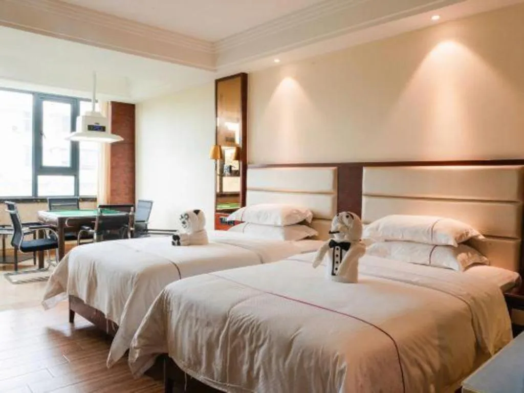 Bed in Haikou Kai Wei Hotel