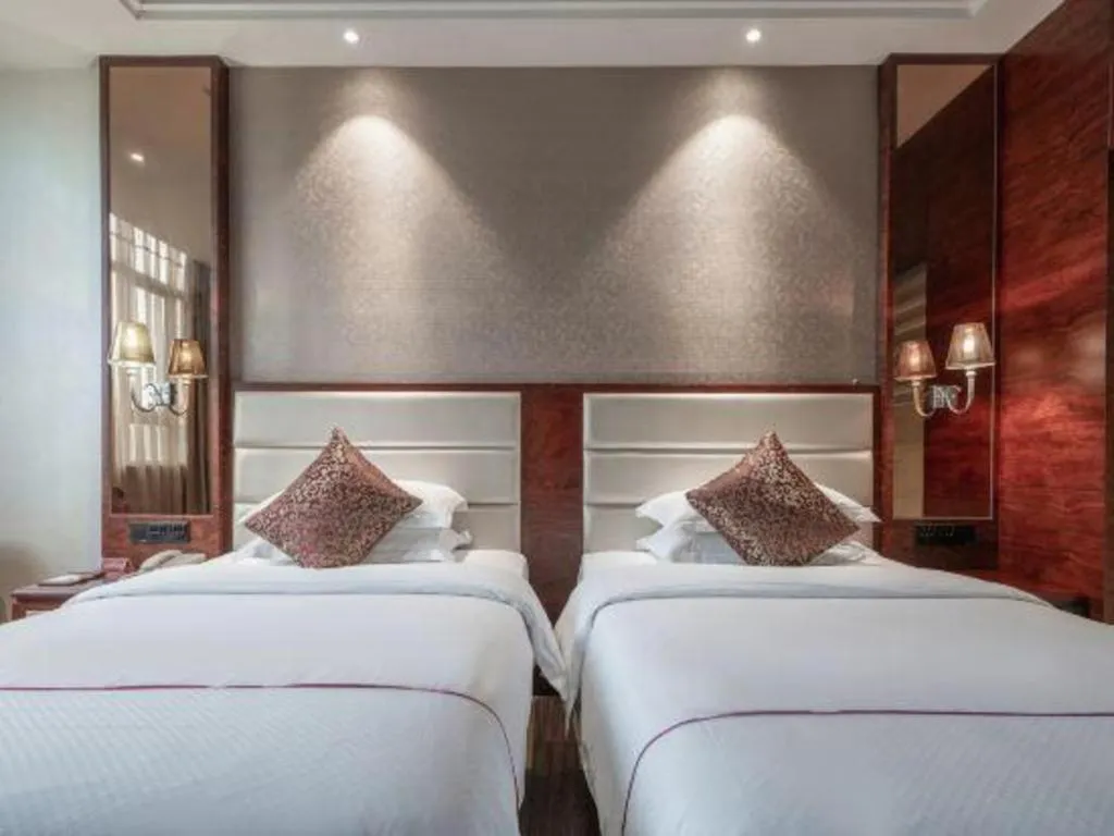 Bed in Haikou Kai Wei Hotel
