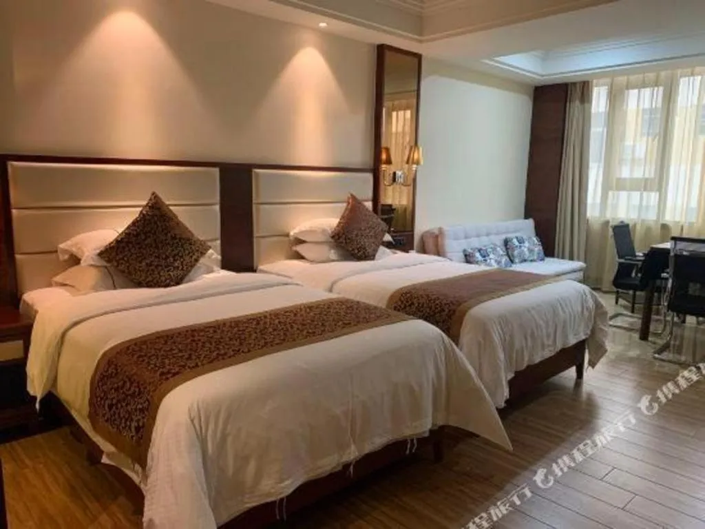 Bed in Haikou Kai Wei Hotel