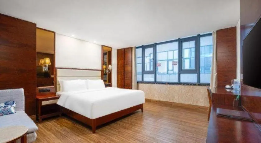 Bed in Haikou Kai Wei Hotel