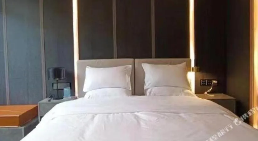 Bed in Haikou Kai Wei Hotel