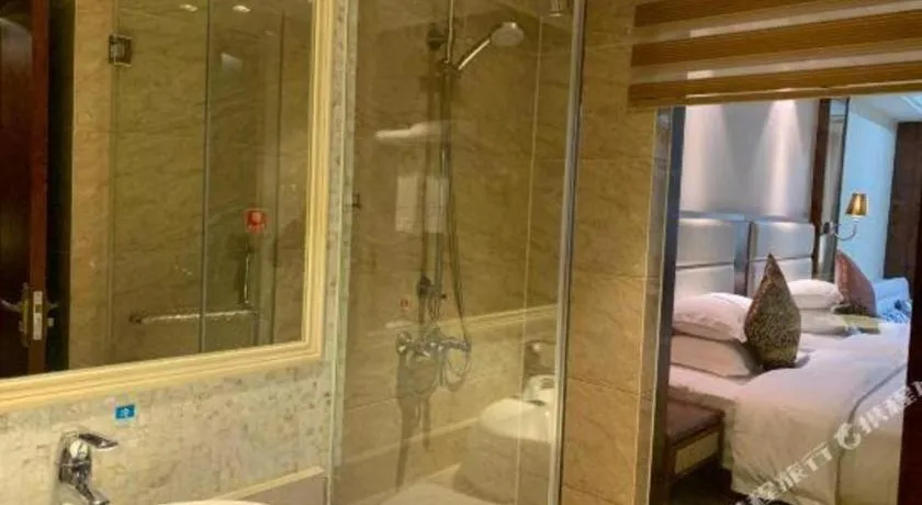 Bed in Haikou Kai Wei Hotel