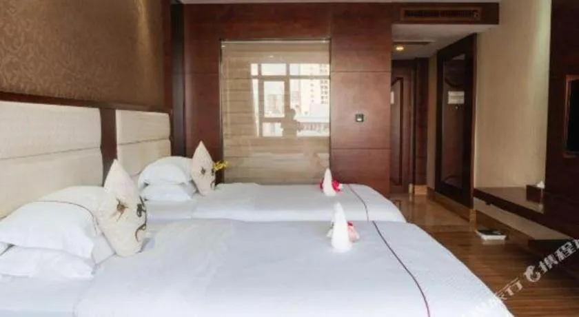 Bed in Haikou Kai Wei Hotel