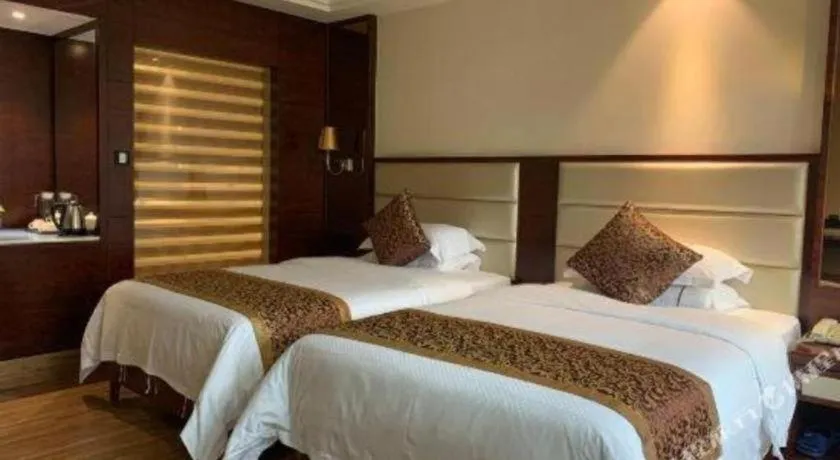 Bed in Haikou Kai Wei Hotel