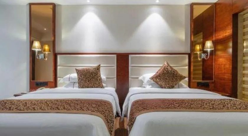 Bed in Haikou Kai Wei Hotel