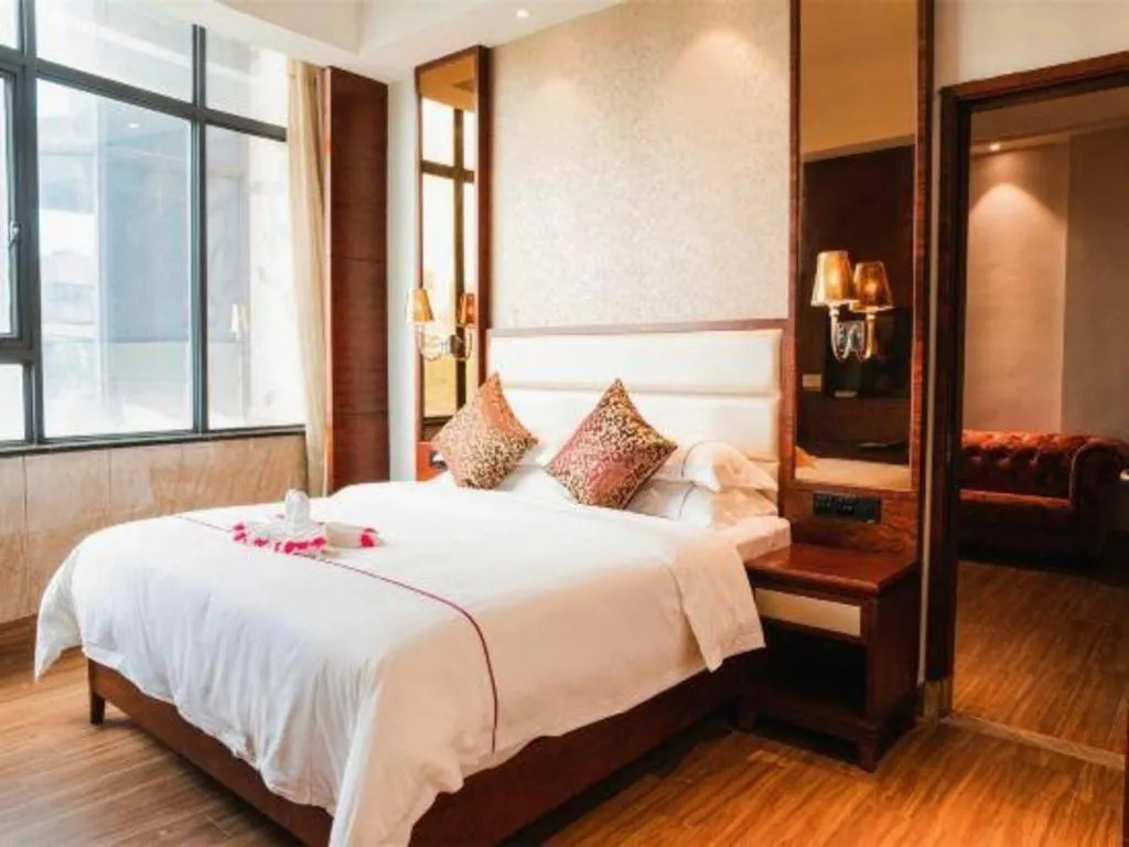 Bed in Haikou Kai Wei Hotel