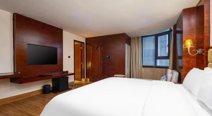 Bed in Haikou Kai Wei Hotel