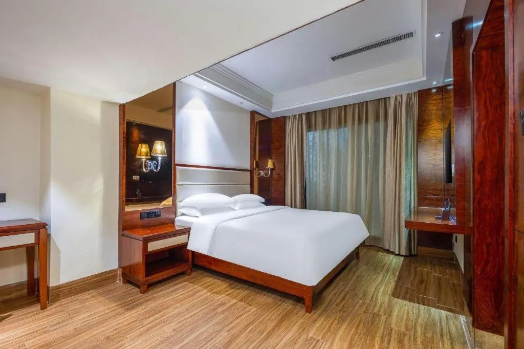 Bed in Haikou Kai Wei Hotel