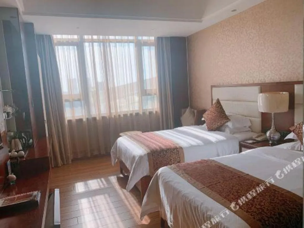 Bed in Haikou Kai Wei Hotel