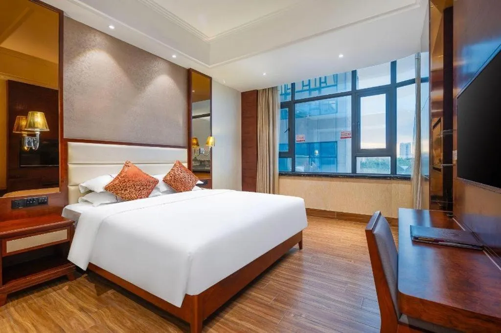 Bed in Haikou Kai Wei Hotel