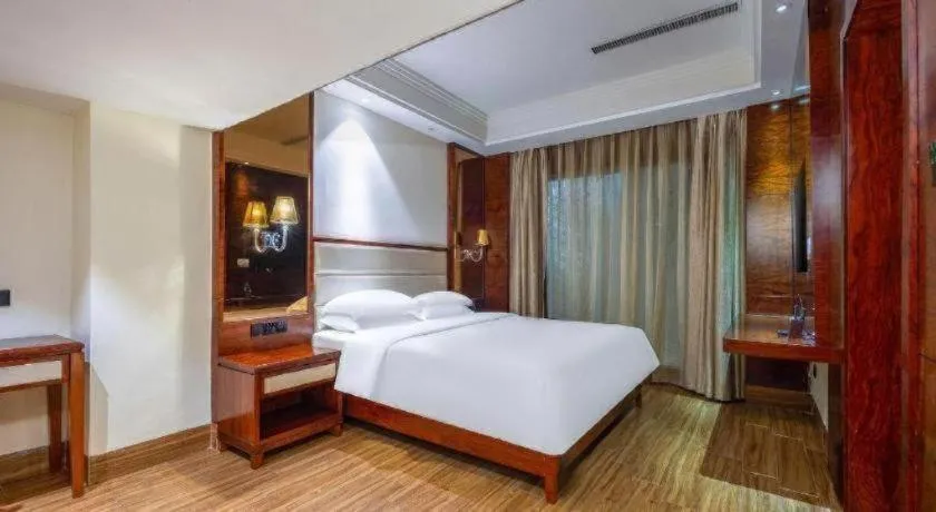 Bed in Haikou Kai Wei Hotel