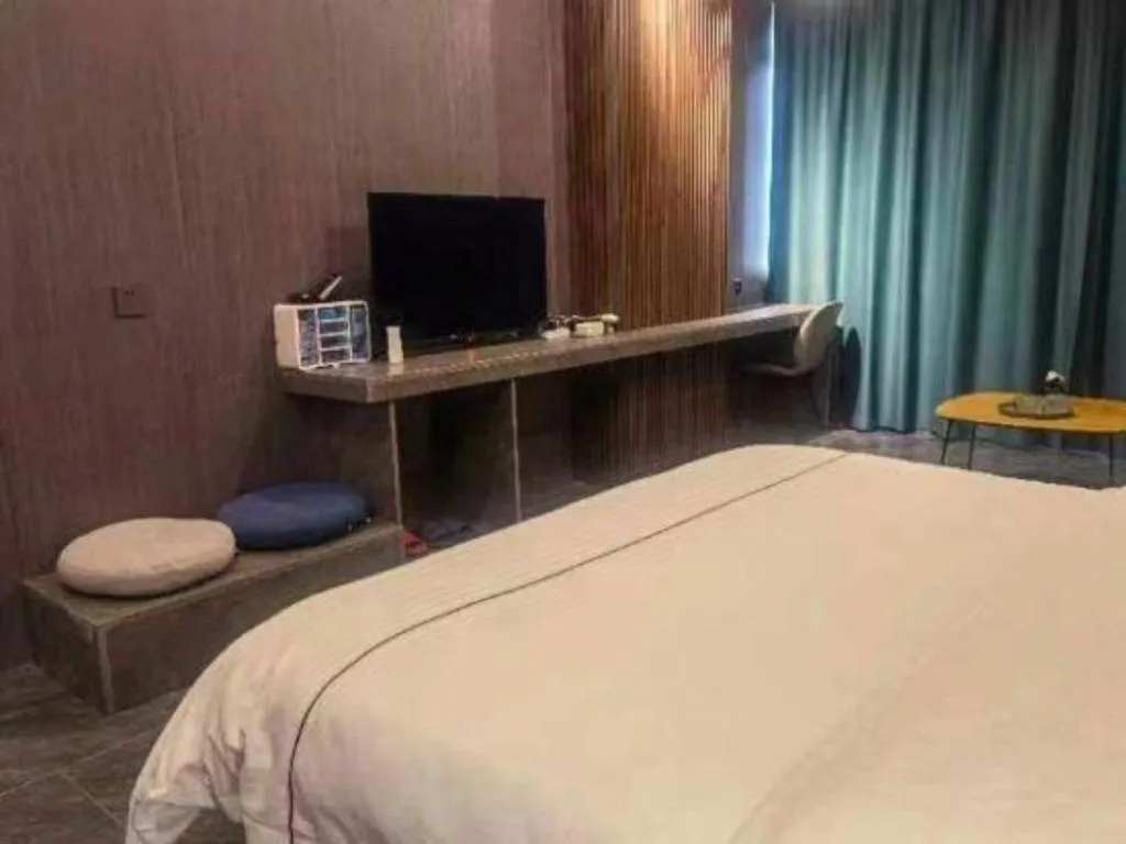 Bed in Haikou Kai Wei Hotel