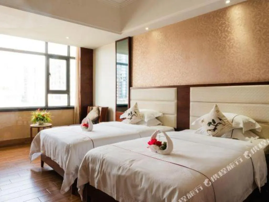 Bed in Haikou Kai Wei Hotel