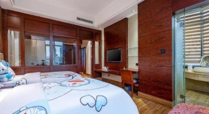 Bed in Haikou Kai Wei Hotel