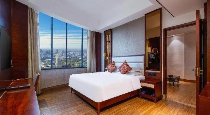 Bed in Haikou Kai Wei Hotel