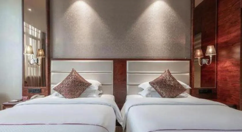 Bed in Haikou Kai Wei Hotel