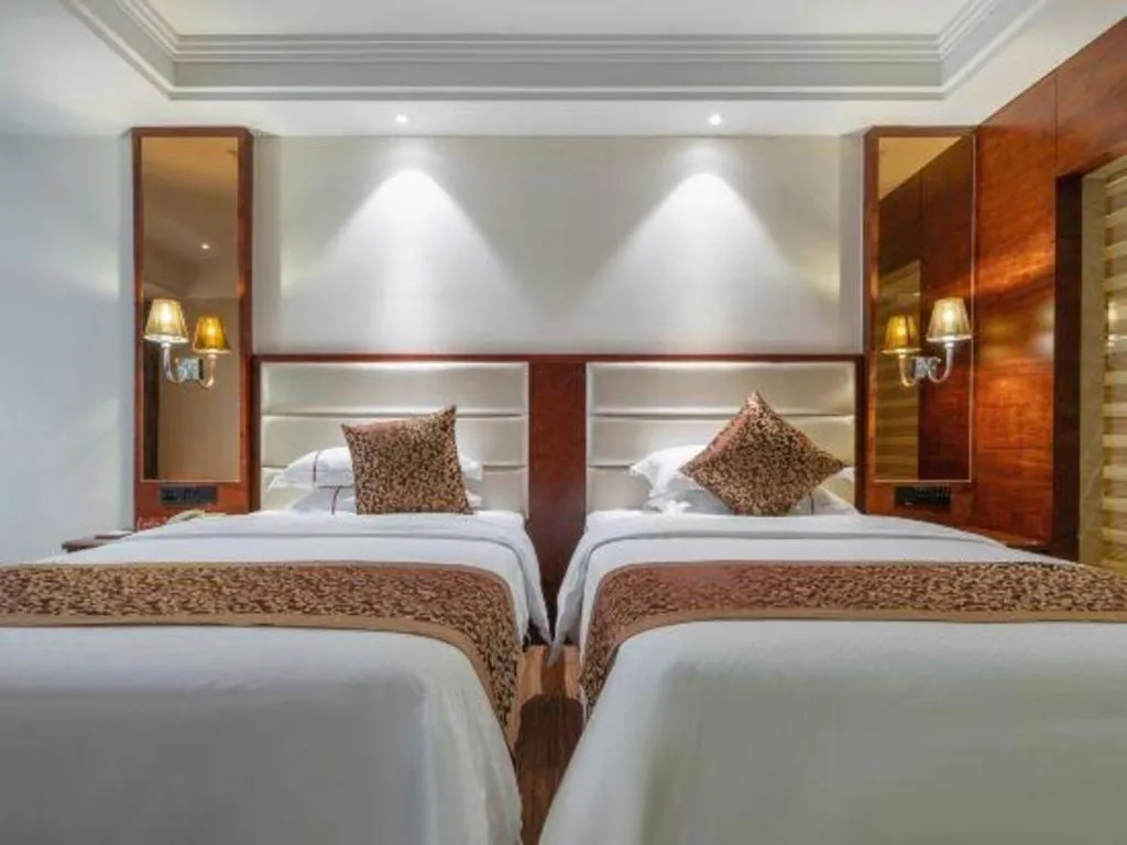 Bed in Haikou Kai Wei Hotel