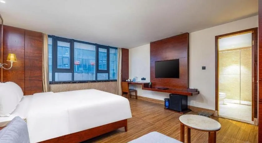 Bed in Haikou Kai Wei Hotel