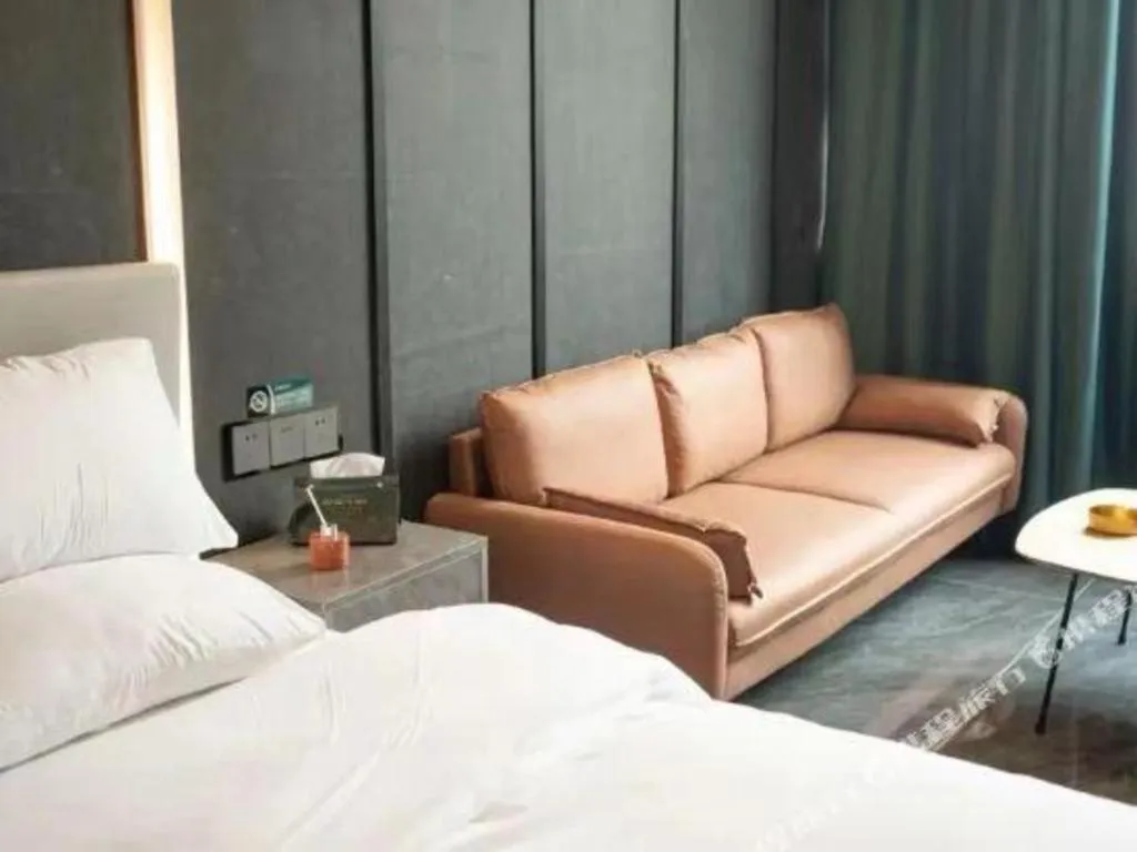 Bed in Haikou Kai Wei Hotel