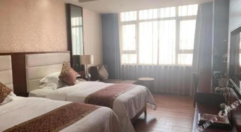 Bed in Haikou Kai Wei Hotel