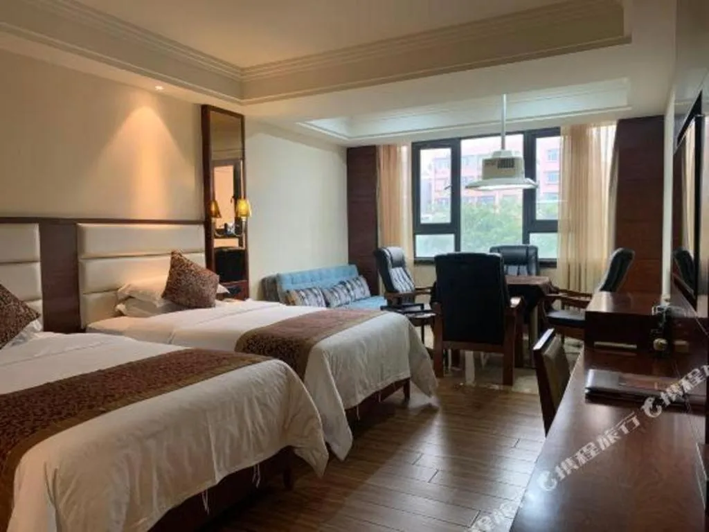 Bed in Haikou Kai Wei Hotel