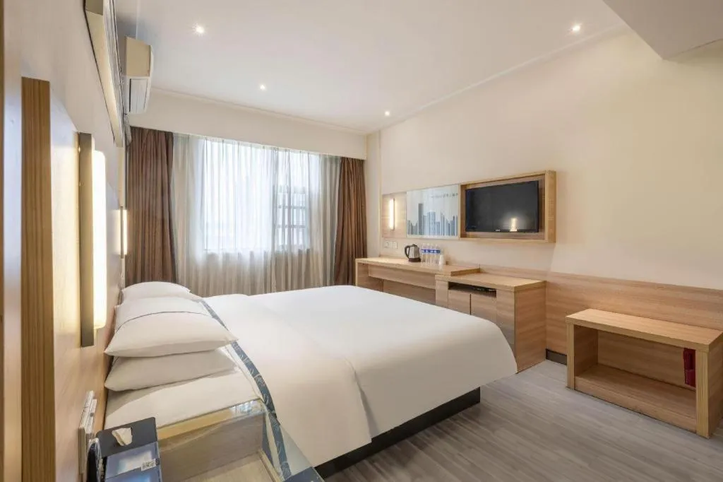 Bed in City Comfort Inn Huanggang Baota Avenue