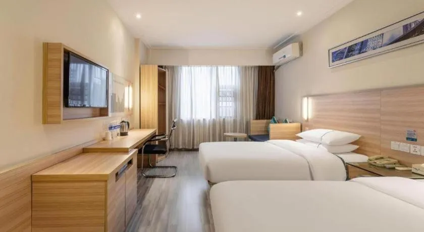 Bed in City Comfort Inn Huanggang Baota Avenue