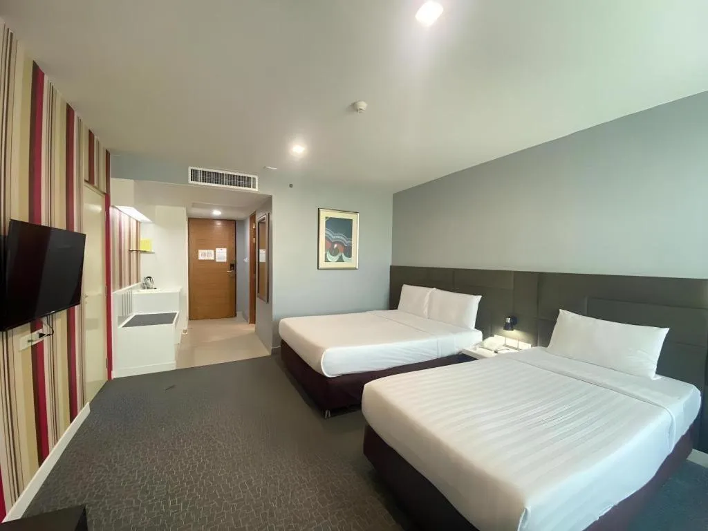 Bed in Thamrongin Hotel