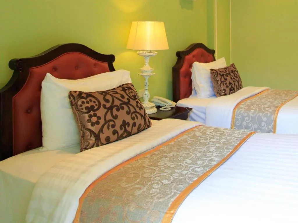 Bed in Khamthana the Colonial Hotel Chiangrai