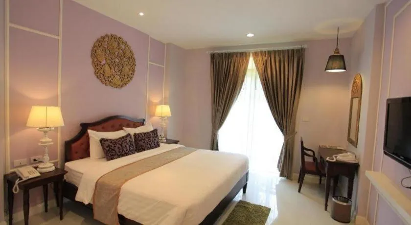 Bed in Khamthana the Colonial Hotel Chiangrai