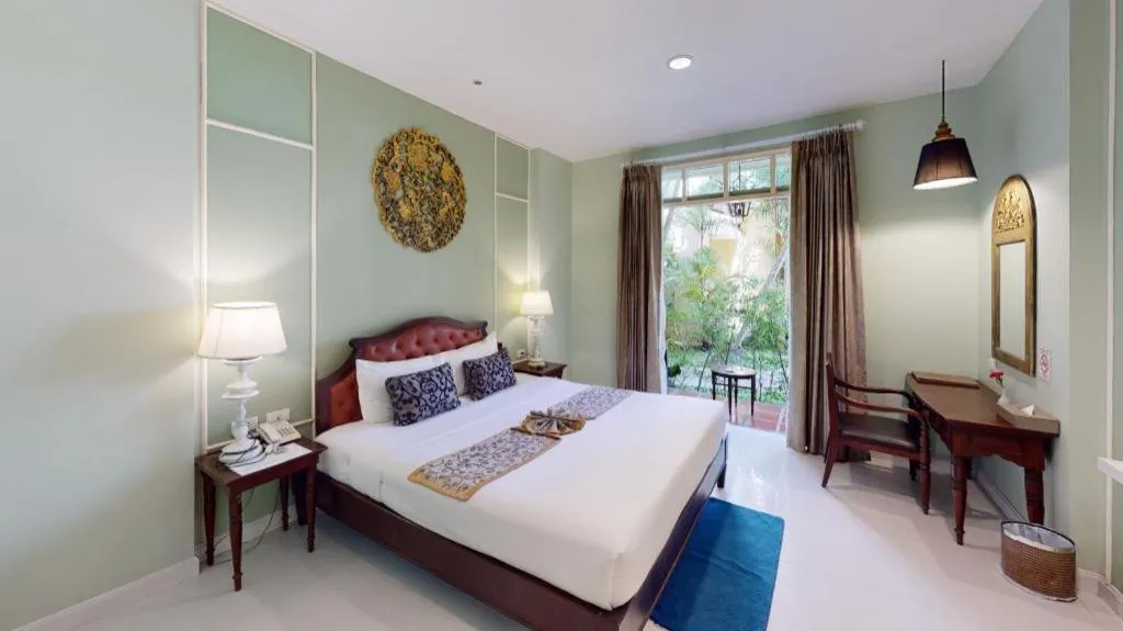 Bed in Khamthana the Colonial Hotel Chiangrai