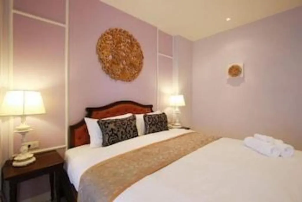 Bed in Khamthana the Colonial Hotel Chiangrai