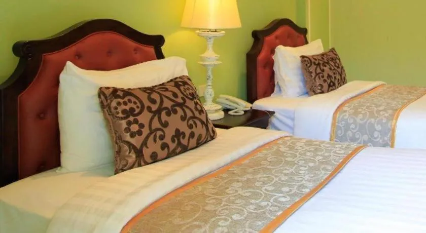 Bed in Khamthana the Colonial Hotel Chiangrai