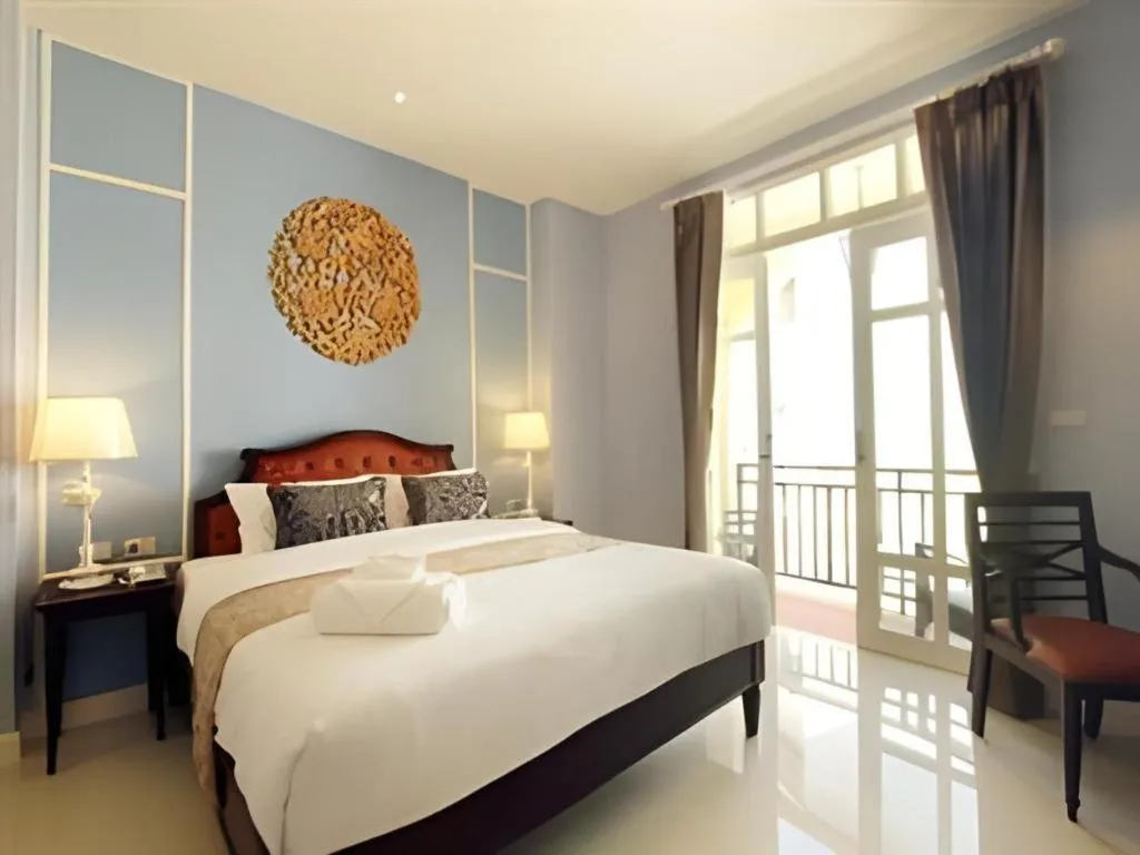 Bed in Khamthana the Colonial Hotel Chiangrai