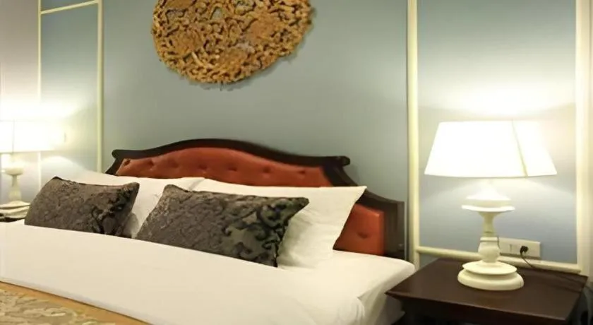 Bed in Khamthana the Colonial Hotel Chiangrai