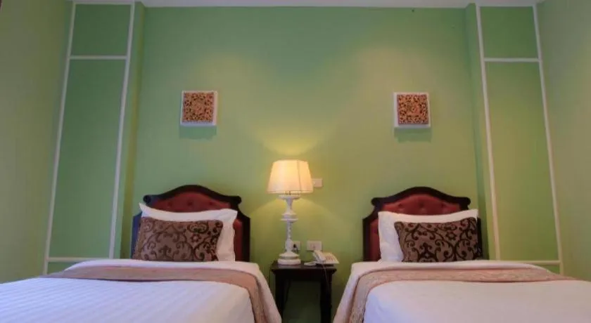 Bed in Khamthana the Colonial Hotel Chiangrai