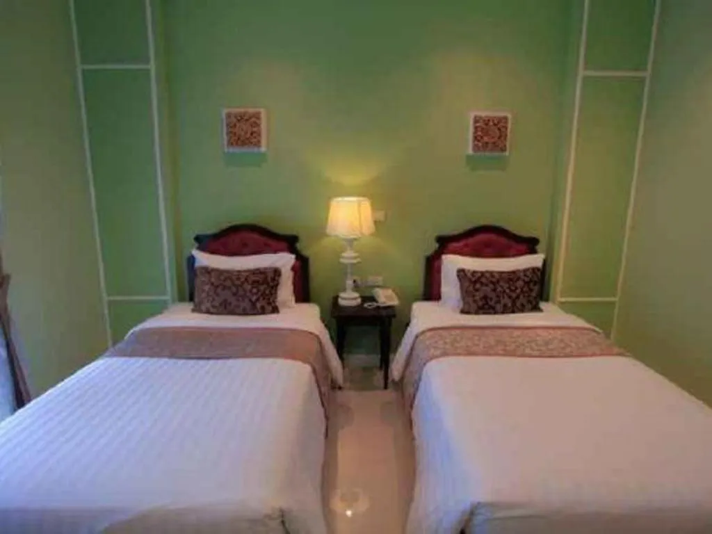 Bed in Khamthana the Colonial Hotel Chiangrai