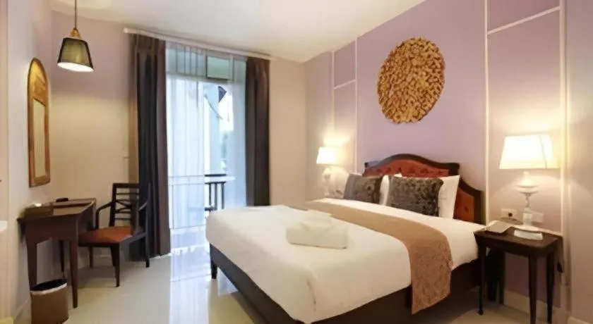 Bed in Khamthana the Colonial Hotel Chiangrai