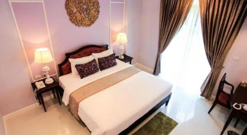 Bed in Khamthana the Colonial Hotel Chiangrai