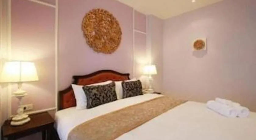 Bed in Khamthana the Colonial Hotel Chiangrai