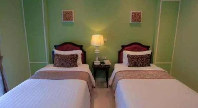 Bed in Khamthana the Colonial Hotel Chiangrai