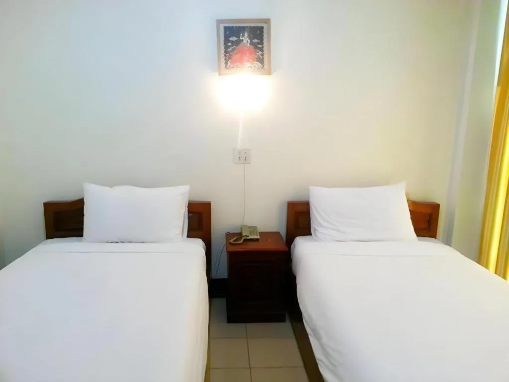 Bed in Sisavath Hotel