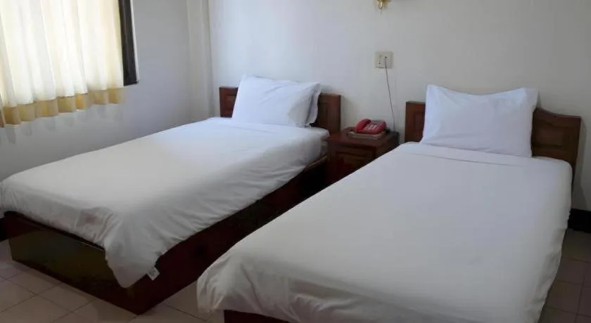 Bed in Sisavath Hotel