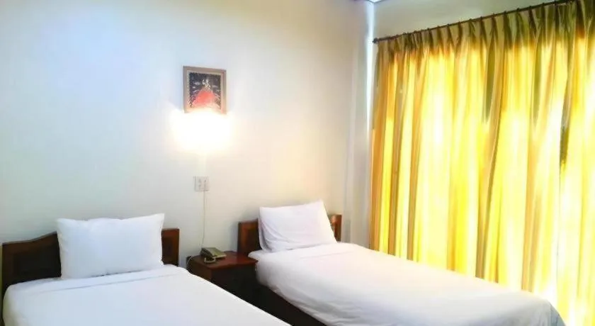 Bed in Sisavath Hotel