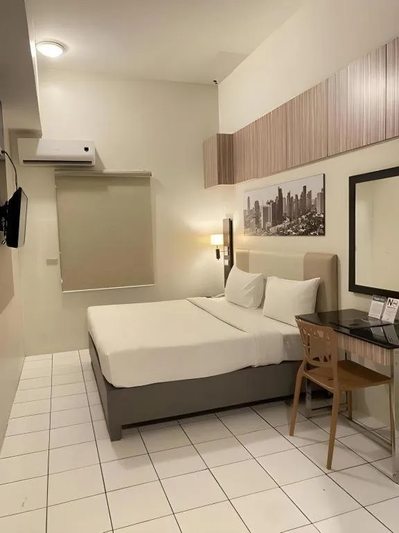 Bed in Majestic Hotel Manila - Formerly Octagon Mansion Hotel Manila