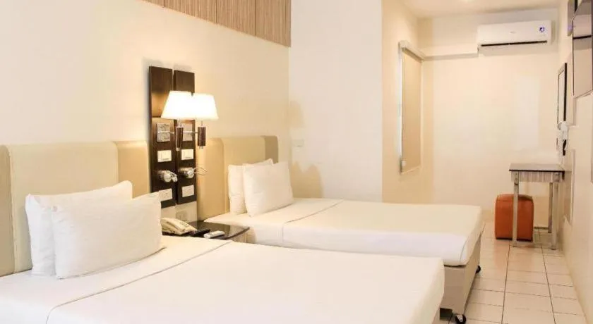 Bed in Majestic Hotel Manila - Formerly Octagon Mansion Hotel Manila